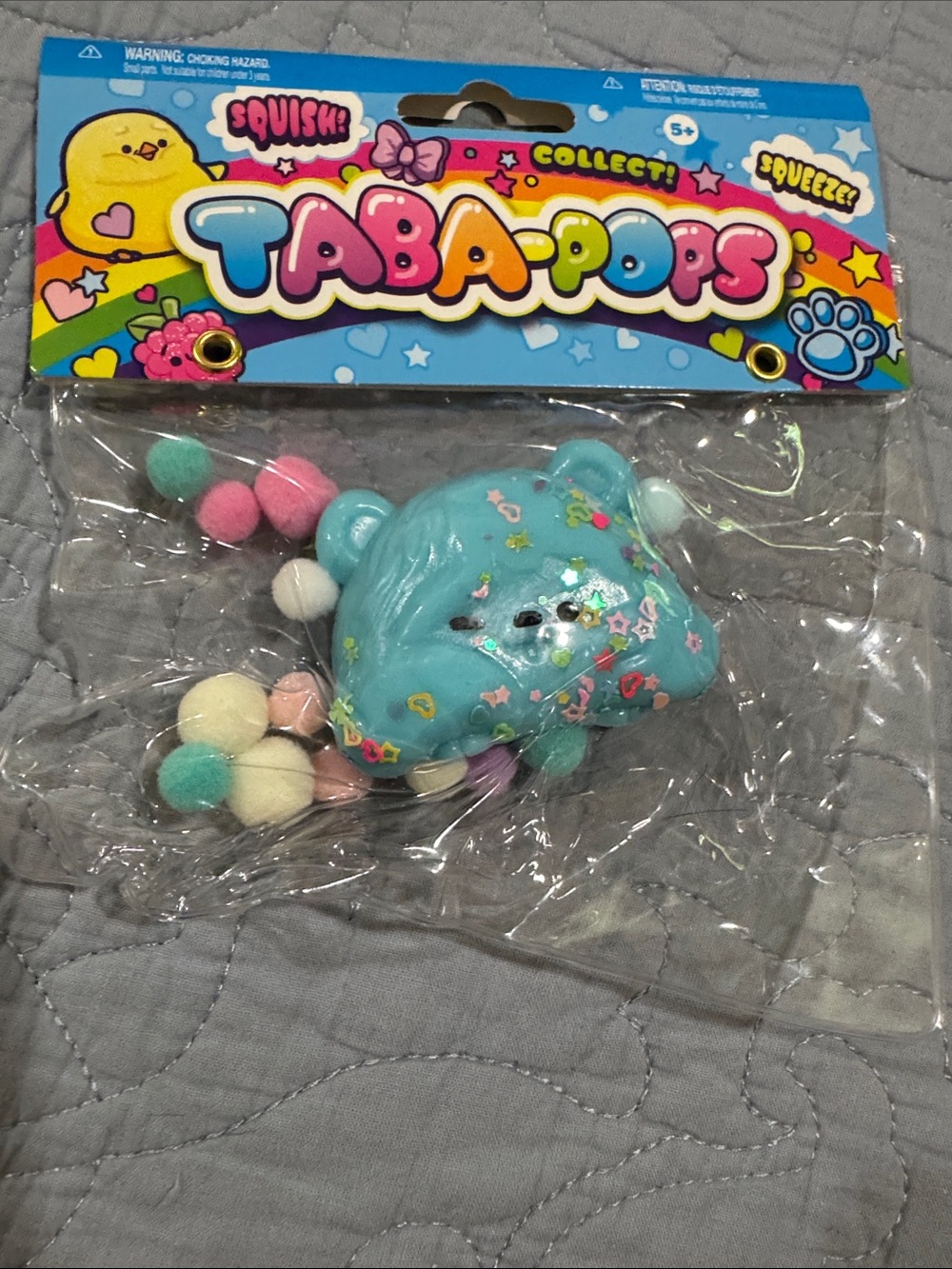 Tana-Pops Blue Bear Squishy Toy with Pom Pom Accents